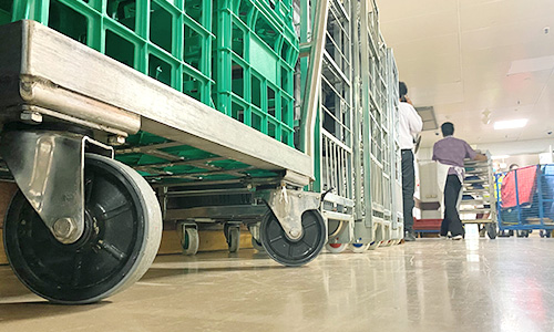 Stainless steel castors on a hospital trolley